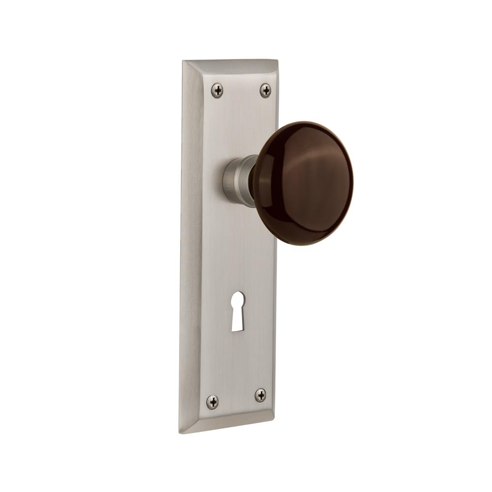 Nostalgic Warehouse NYKBRN Passage Knob New York Plate with Brown Porcelain Knob with Keyhole in Satin Nickel